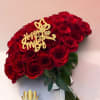 Bouquet of red roses with a gold "Happy Mother's Day" topper