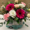 Celebrate the adventure of love with this unique arrangement! 