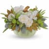 White roses and green mums in a pale green pumpkin vase