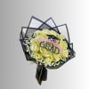 Yellow rose bouquet with a graduation topper and black wrap