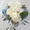 Ever popular Blue and white hydrangeas billow out like clouds, surrounded by
