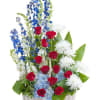 A basket filled with an honorable display of red, white, and blue