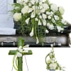 Elegant white casket spray, wreath, and tribute.

The Elegance Trio from Morningside Florist