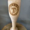 Texas Rangers wooden baseball bat-shaped trophy on a stand