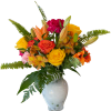 Colorful bouquet of roses, lilies, and daisies in a white vase