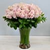 100 premium long stem roses. This grand arrangement stands taller than 28''