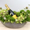 Pale green orchids with dark centers tuck into a playful, low-profile celebration