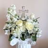 A beautiful bouquet with a crystal Glass Cross that becomes a table