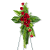 Standing floral cross with red roses and green foliage