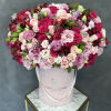 Large pink and red rose bouquet in a pale pink hatbox