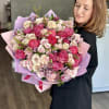 A stunning and colorful arrangement of fine flowers is ideal for any