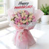 Pink and cream rose bouquet with an anniversary card