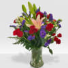 Red and purple flowers a very passionate flowers mix in a clear