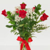 6 beautiful red roses in a vase with baby breath and greens
