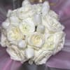 White rose and tulip bouquet wrapped in lavender paper