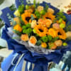 A radiant fusion that illuminates the night. Vibrant sunflowers and soft beige