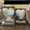 Gift box with a painted heart ornament and tassel
