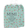 Mint green floral-print blanket with the word MIMI and a message