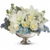 As magical and unforgettable as an elegant affair! Creamy roses and snow