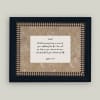 Framed wall art with a handwritten Bible verse on a beige background