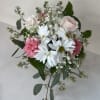 Bouquet of white daisies, pale pink roses, and pink carnations