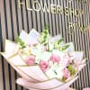 Soft pink roses paired with delicate white alstroemeria and tall green snapdragon