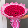 A lavish dome of 100 tightly packed pink roses creates an immediate