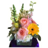 A group of hydrageas, roses, snapdragons, larkspurs, stocks and gerberas in a