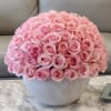 Large bouquet of pink roses in a white vase