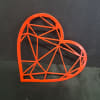 Bold geometric lines form the first impression of this metal heart wall