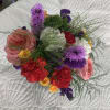 Mixed bouquet with pink, red, purple, and yellow flowers