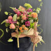 This weekly seasonal arrangement showcases queen Anne's lace, roses, and cosmos.

Our "Designs