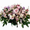 Pink and lavender floral casket spray with roses and alstroemeria