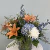 This beautiful low-profile arrangement is perfect for any occasion. This stunning mix