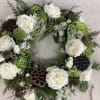 Honor your loved one with this organic, natural, woodsy style urn wreath