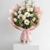 Elegant, fresh, and softly refined, this bouquet features a delicate blend of