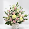 This lush, garden-inspired vase arrangement is professionally designed in a classic white