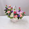 A sweet basket of colorful blooms, sure to brighten anyone's day!
Show them