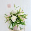 Hermoso arreglo en base de colores en tonos pastel, ideal para sorprender
