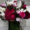 Get ready to have your senses tickled by this floral masterpiece that