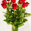 Bouquet of red roses in a clear glass vase