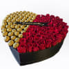 Heart-shaped box with red roses and gold-wrapped chocolates