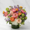 A gorgeous and luxurious presentation of pink peonies, white hydrangeas, lilac, viburnum