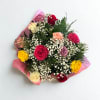 A joyful swirl of color greets the eye: a dozen mixed rose
