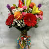 Party on with this fun and vibrant arrangement. This arrangement is ready