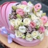 Pink and white rose bouquet in a pink hat box with a lavender ribbon