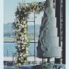 A breathtaking 10 by 8 ft ,floral arch with lush premium blooms