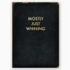 Black notebook with gold text reading Mostly Just Whining