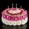 Imagine presenting a floral "cake" that reads like a party in bloom
