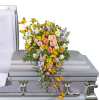 Casket spray with pink and cream roses, lavender flowers, and orange butterflies
